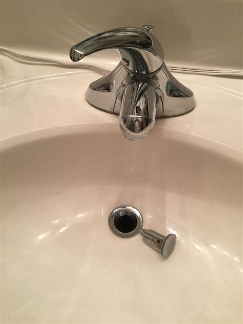 home.furnitureanddecorny.com:bathroom sink stopper came out