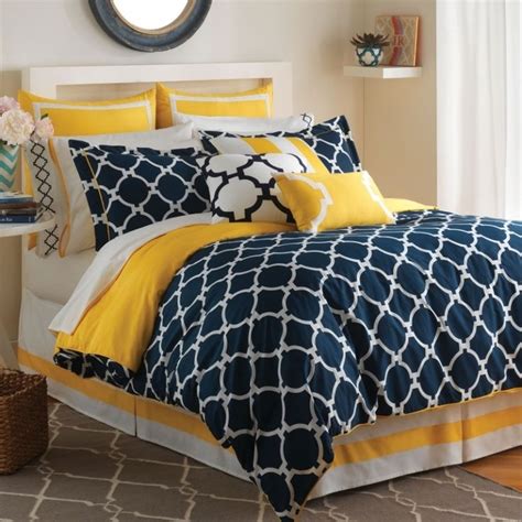 Create A Beach Inspired Bedroom With Yellow Walls, Navy And White Bedding