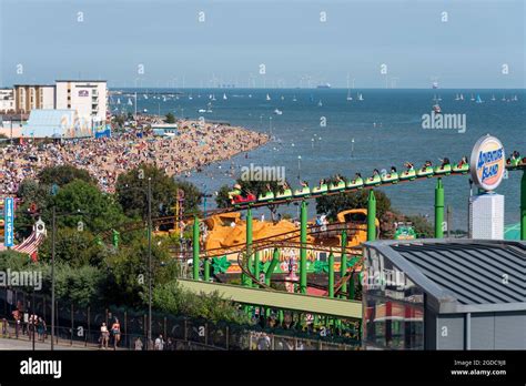 alt text: A surfer riding a wave, surrounded by the vastness of the ocean