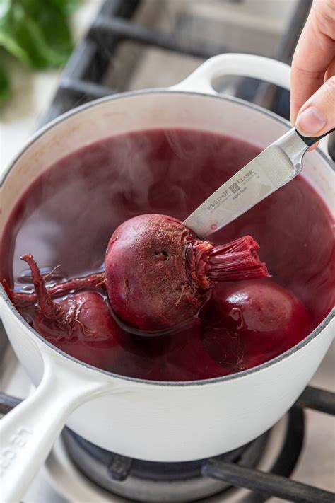 Beetroot boiling in a pot of water