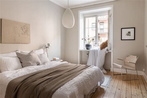beige walls bedroom ideas with statement lighting
