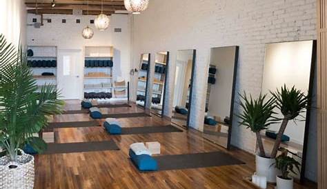 Attractive large yoga studio space with new light wood flooring, lots