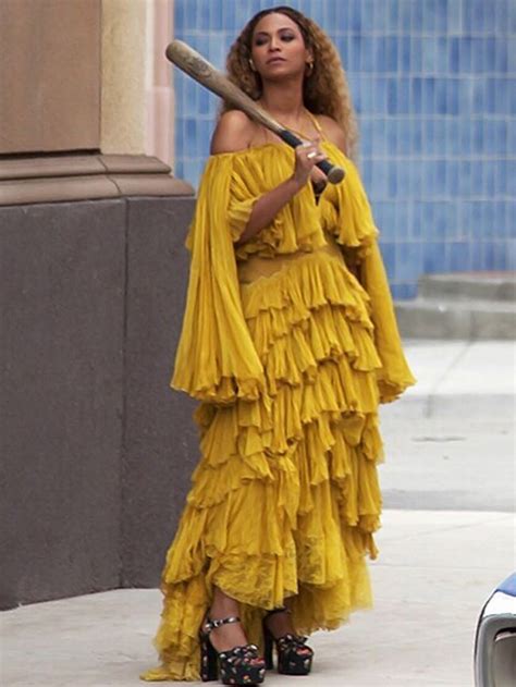 beyonce in a yellow dress