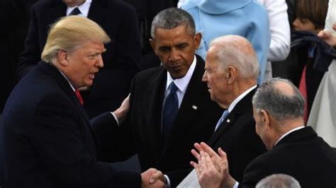 biden shaking hands with trump