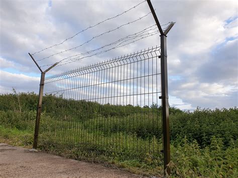 big barb wire fence