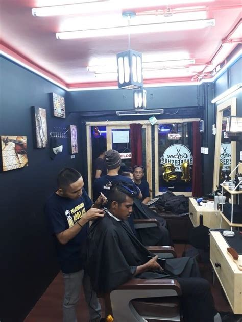 noun Also called, especially British, barber's shop. the place of business of a barber. the