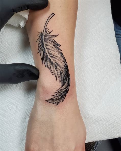 Revolutionary Black And White Feather Tattoo Designs References