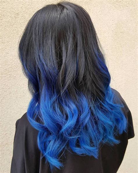 Transform Your Look With Black Hair And Blue Tips