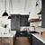 black kitchen cabinets with wood accents
