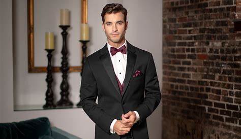 Romantic groom look, maroon suit, black bow tie, outdoor