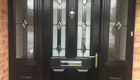 Black Upvc Front Door And Frame Rock With White UPVC Facade House