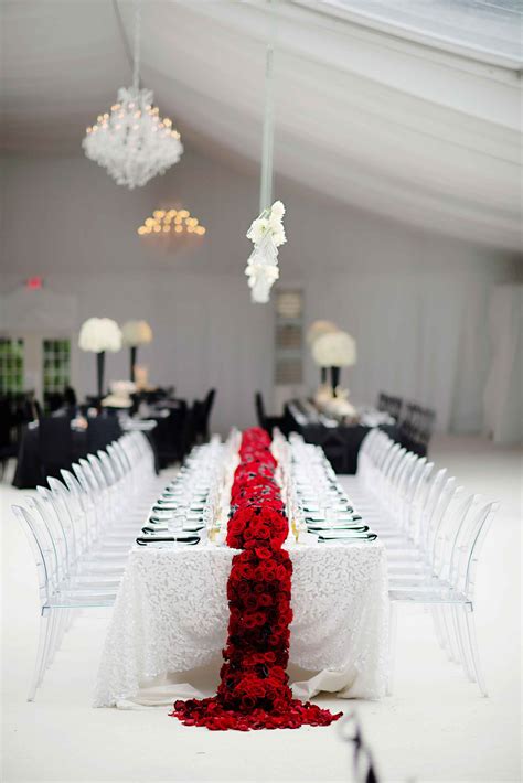 red black and white wedding reception, red roses, large center pieces