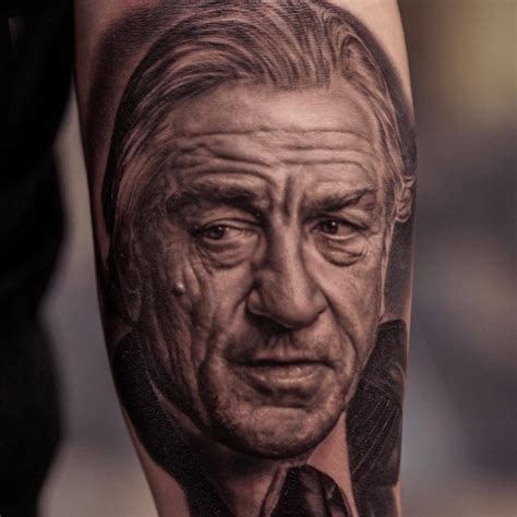 black and gray portrait tattoos