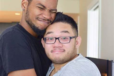 BLACK ASIAN GAY COUPLE