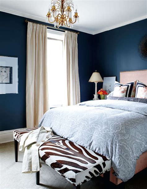 black bedroom furniture with blue walls