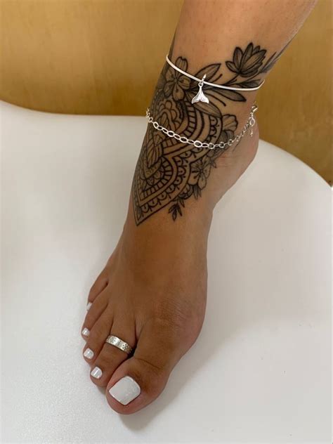 Powerful Black Foot Tattoo Designs 2023