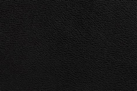 Unleash the Power of Boldness with Stunning Black Leather Backgrounds - A Classic Choice for Elevated Aesthetics!