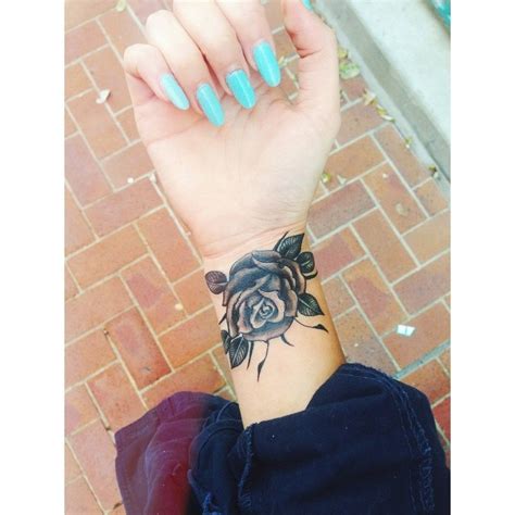 Powerful Black Rose Wrist Tattoo Designs References