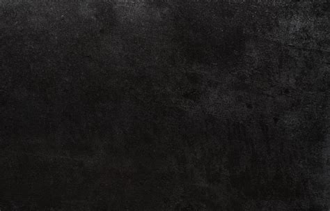 The Bold and Powerful Statement of a Black Stone Background - Add a touch of sophistication and drama to your design with an impressive black stone background.