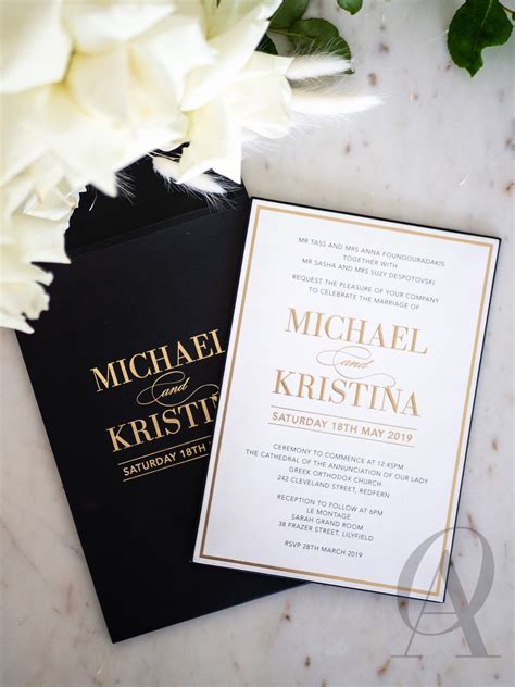 black white and gold engagement invitations