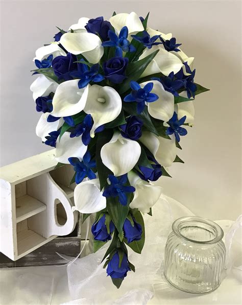Blue calla lily cascading bouquet with silver pearls The Bridal
