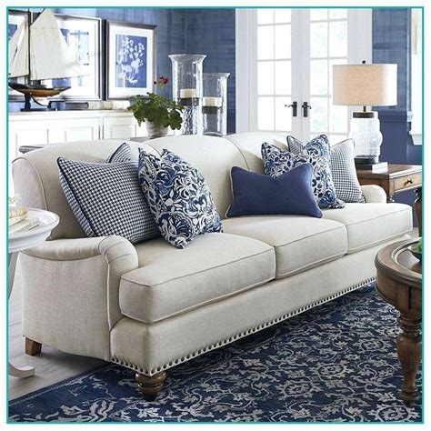 Favorite Blue Cushions On Beige Sofa For Small Space