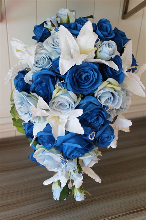 Freesia, eustoma, tulip, rose, lavender bridal bouquet. Blue and White