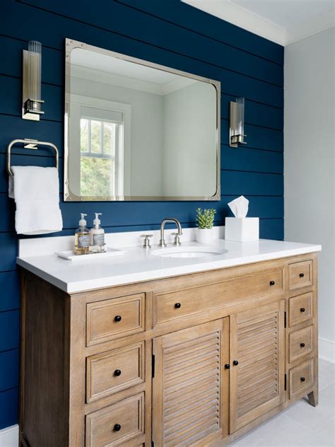 blue bathroom with an accent wall