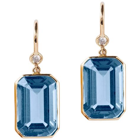 blue emerald earrings