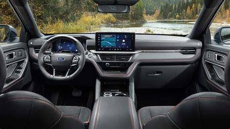 Luxurious interior of a blue Ford Explorer ST, highlighting premium materials and driver-focused cockpit