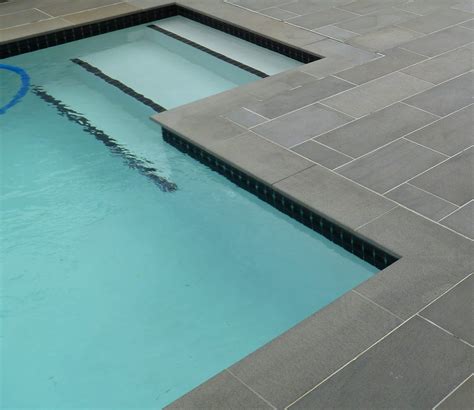 Bluestone coping around pool is durable