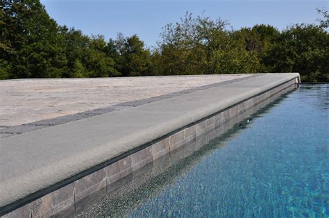 Bluestone coping around pool is easy to install