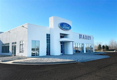 Bob Maxey Ford dealership lot with a variety of Ford vehicles