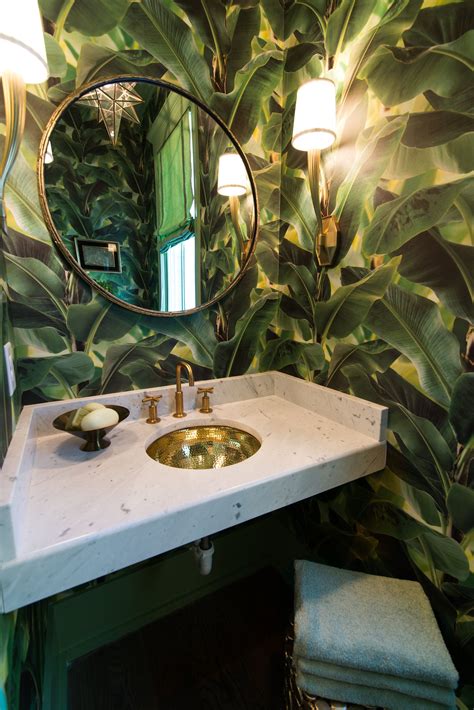 boho bathroom design with wallpaper and beadboard and rug Vintage