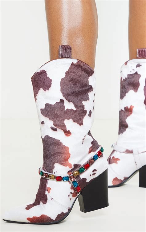 Unveiling the Timeless Charm of Boots with Cow Print: Discover Style, Versatility, and Durability