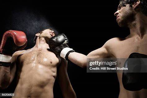 boxer punching opponent