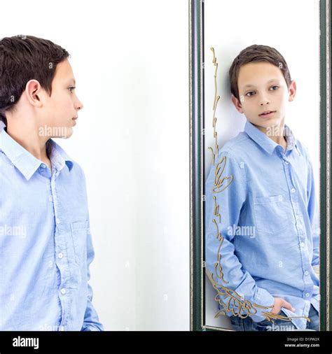 boy in front of mirror