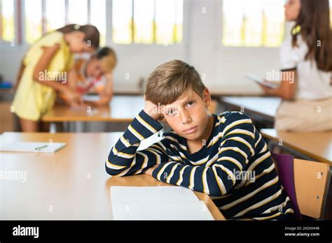 Boy Sitting Desk