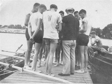 boys in boat coach