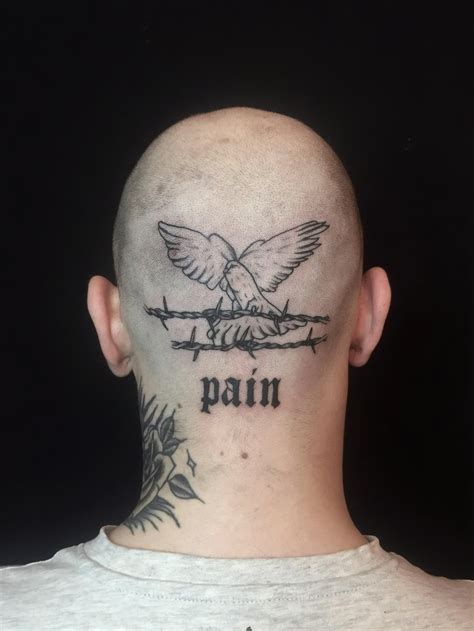 boys neck tattoo pain