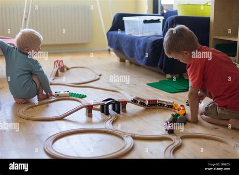 Boys playing on a train