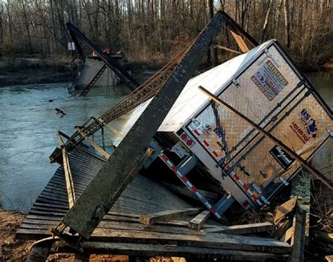 bridge destroys trucks