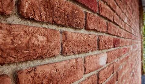 Parement de mur en briques anciennes recoupées 22.000