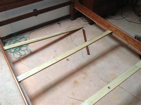broken wooden bed rail