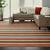 brown and white striped rug