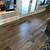 brown wood floors with grey furniture