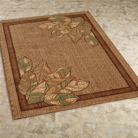 brown area rug with leaves