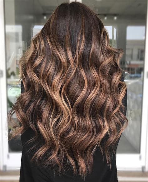 brown hair with caramel highlights curly
