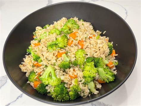 Aromatics Like Bay Leaves and Cinnamon Sticks Placed in a Pot of Brown Rice