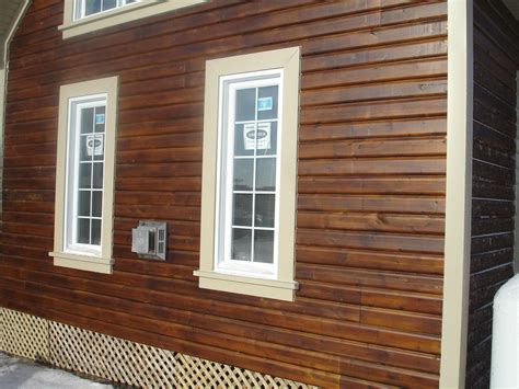 brown stains on vinyl siding